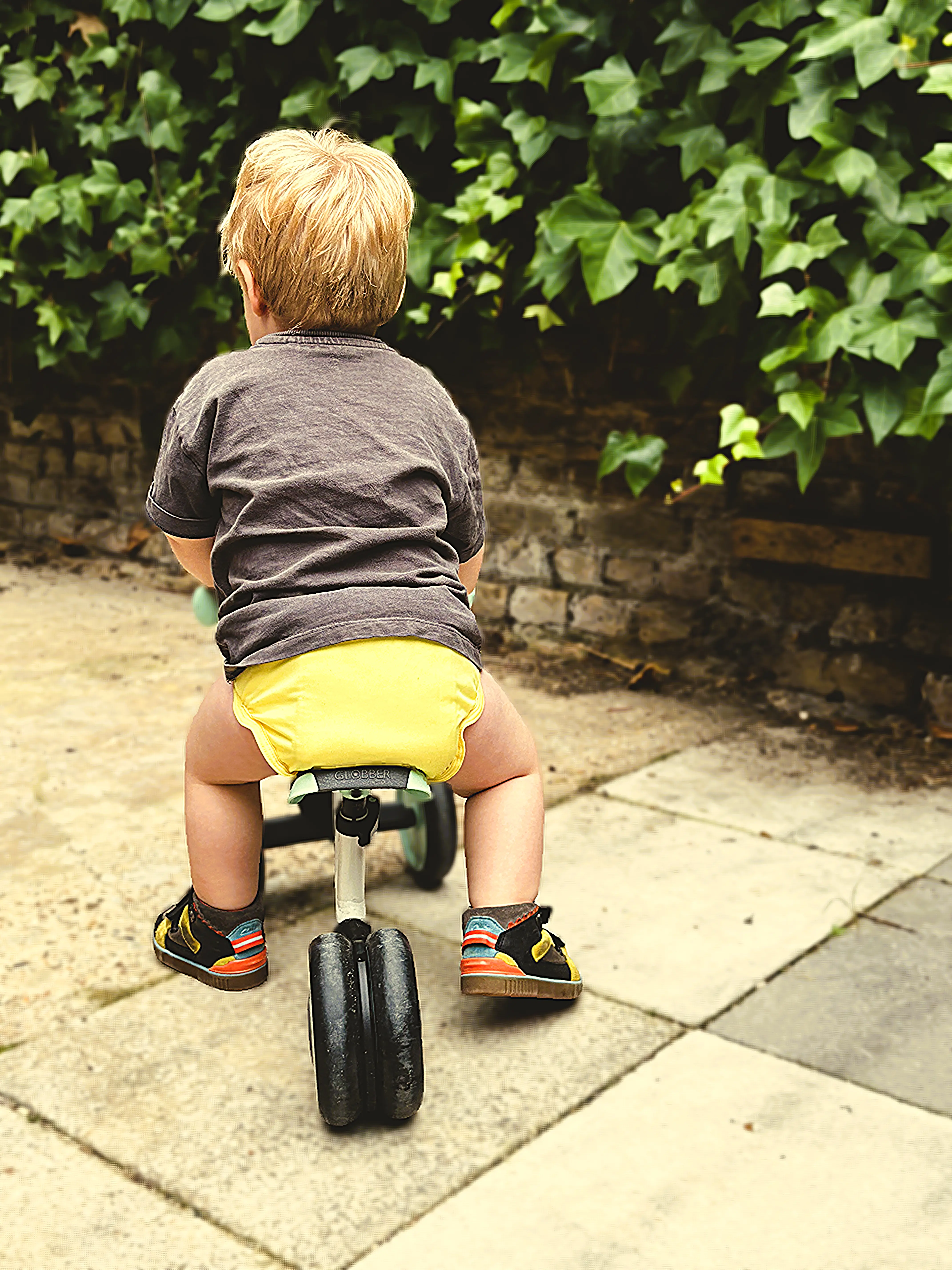 toddler on bike